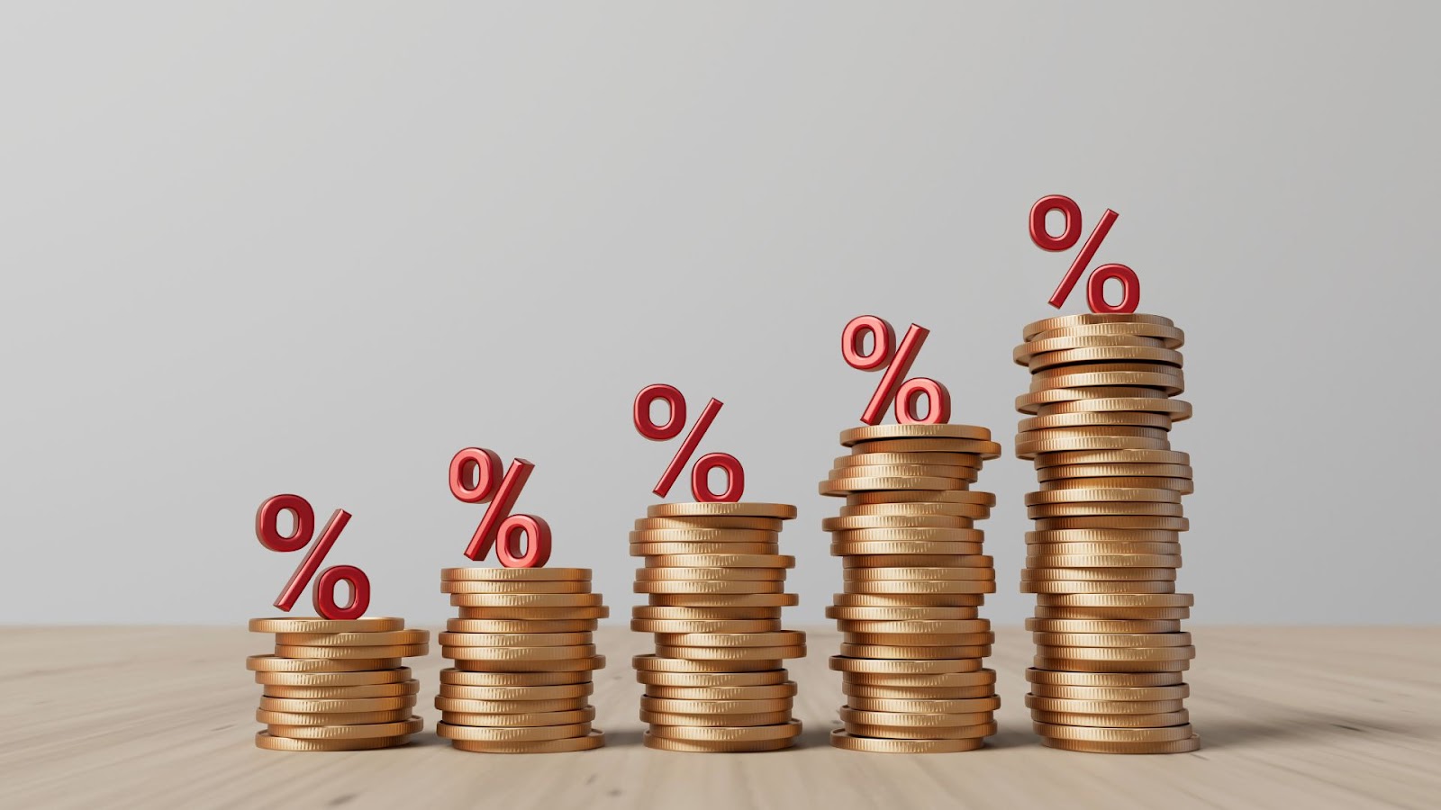 Stack of coins with a percentage sign on top