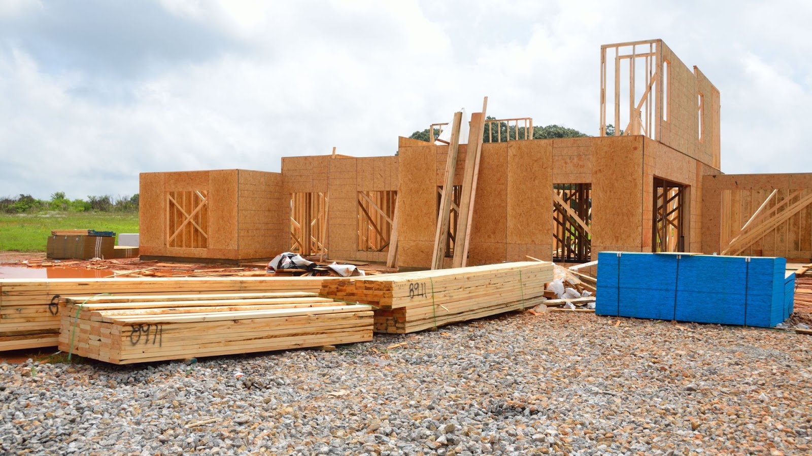 House under construction with wood framing.